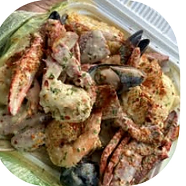 Blue Crab, Shrimp n Mussel Boil in Creamy Alfredo from Traffik Delight Crab Shack